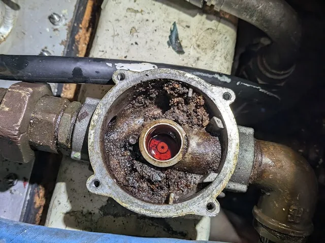 Corroded raw water pump documented during an equipment inspection